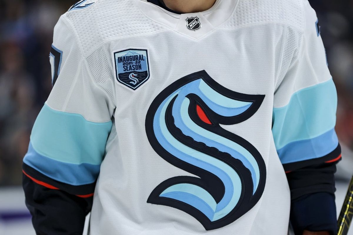 Oct 16, 2021; Columbus, Ohio, USA; The inaugural season patch and team logo are seen on the jersey worn by a member of the Seattle Kraken during a stop in play against the Columbus Blue Jackets in the second period at Nationwide Arena. Mandatory Credit: Aaron Doster-Imagn Images