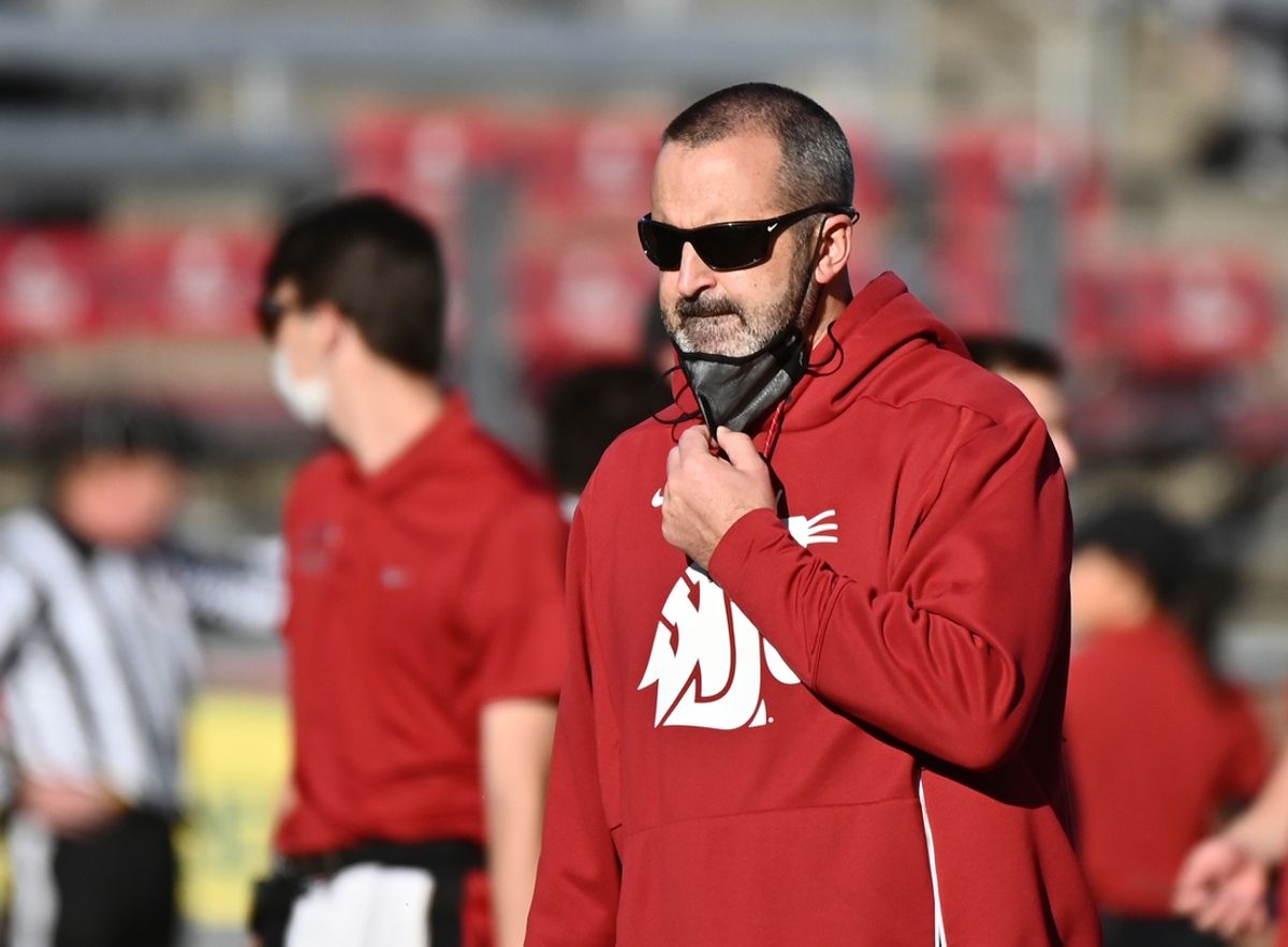 Oct 16, 2021; Pullman, Washington, USA; Washington State Cougars head coach Nick Rolovich looks on during warms before a game against the Stanford Cardinal at Gesa Field at Martin Stadium. Mandatory Credit: James Snook-Imagn Images