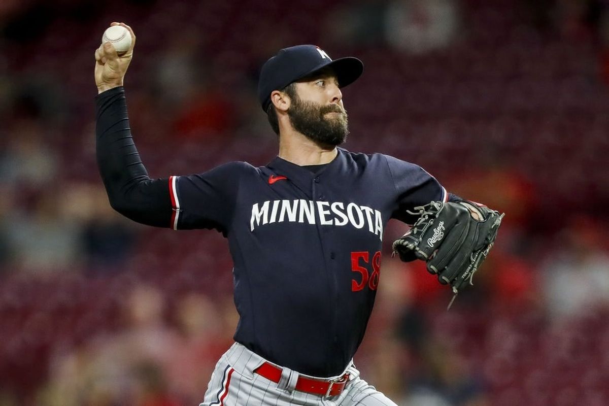 Sep 19, 2023; Cincinnati, Ohio, USA; Minnesota Twins relief pitcher Dylan Floro (58) pitches against the Cincinnati Reds in the ninth inning at Great American Ball Park.