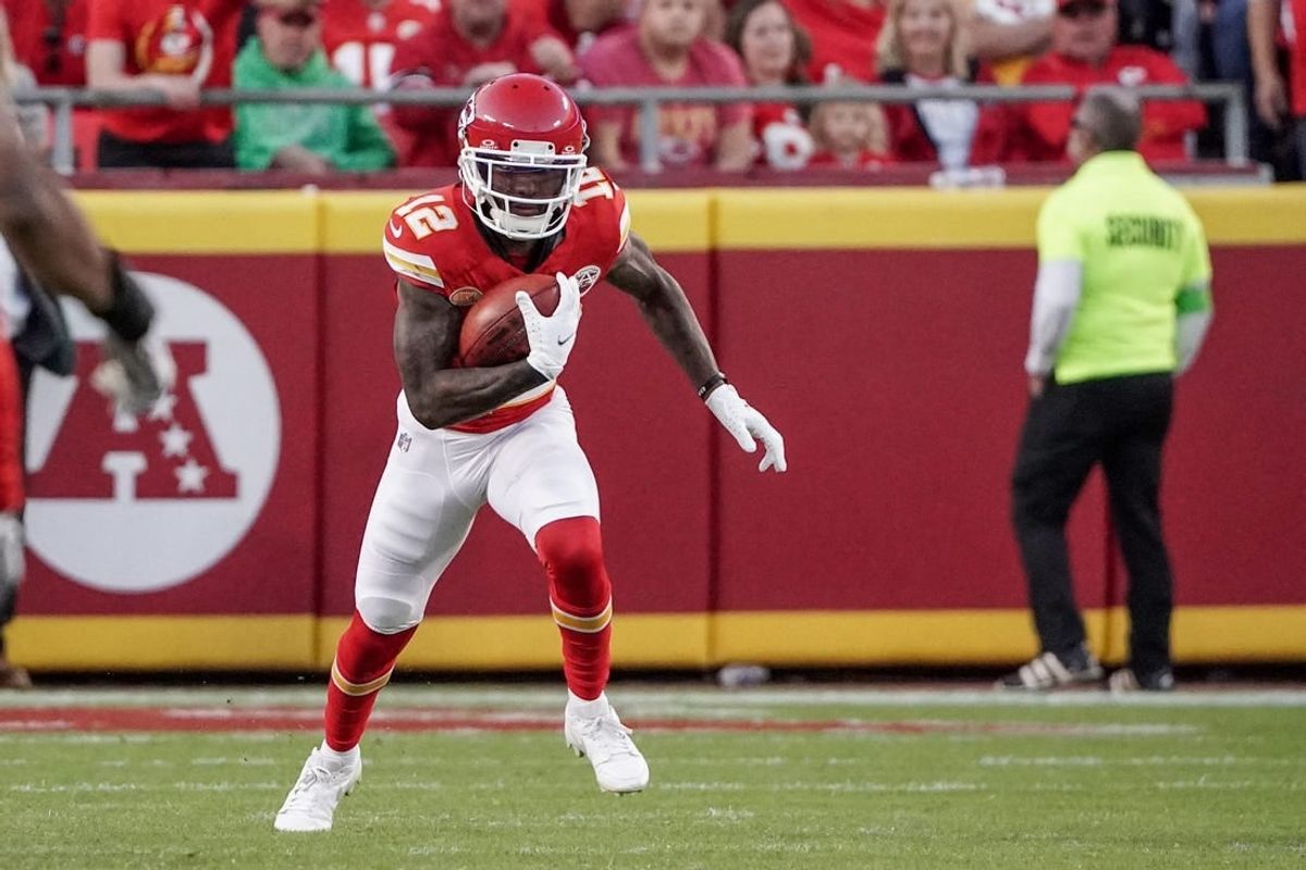Oct 12, 2023; Kansas City, Missouri, USA; Kansas City Chiefs wide receiver Mecole Hardman Jr. (12) returns a kick against the Los Angeles Chargers during the game at GEHA Field at Arrowhead Stadium.