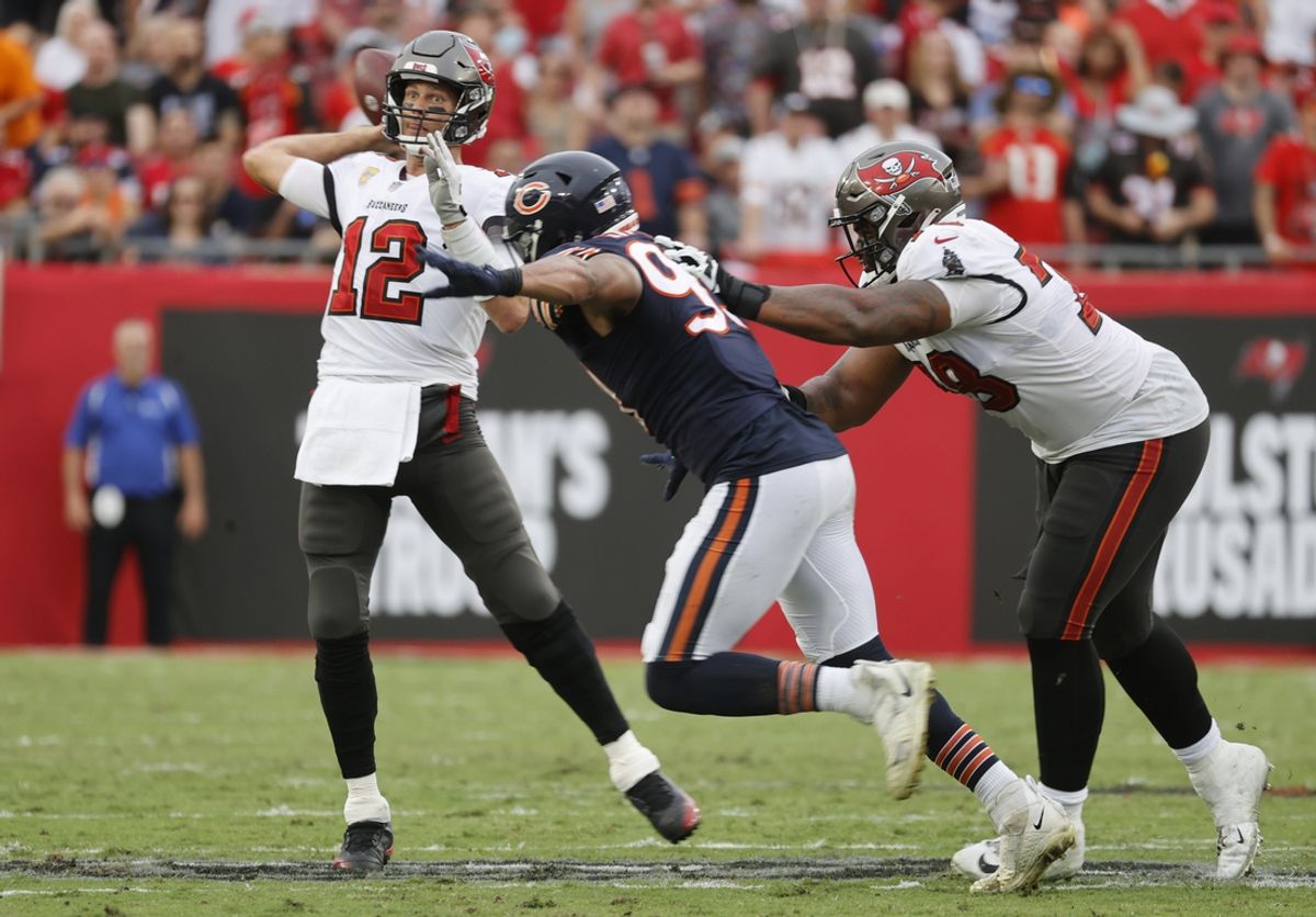 Retired Tampa Bay Buccaneers quarterback Tom Brady (12) attempting a pass against the Chicago Bears. Mandatory Credit: Kim Klement-Imagn Images