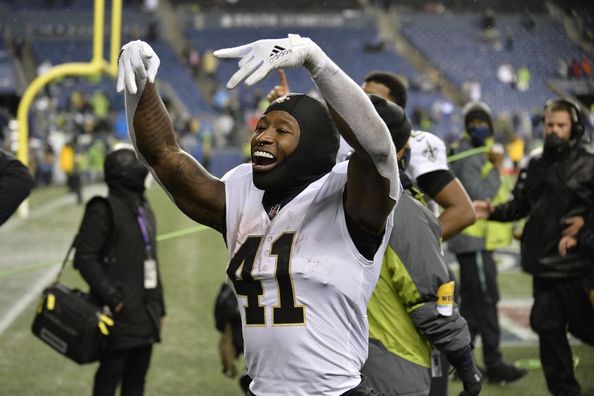 Oct 25, 2021; Seattle, Washington, USA; New Orleans Saints running back Alvin Kamara (41) celebrates after the Seattle Seahawks defeated the Seattle Seahawks at Lumen Field. Mandatory Credit: Steven Bisig-Imagn Images
