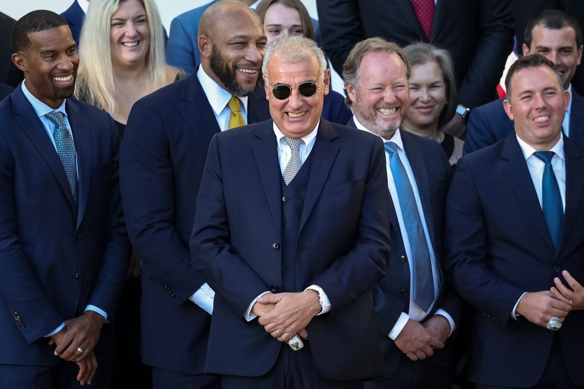 Nov 8, 2021; Washington, DC, USA;  Milwaukee Bucks owner Marc Lasry (center) and Head coach Mike Budenholzer (center-right) react as U.S. President Joe Biden welcomes the Milwaukee Bucks to the South Lawn of the White House to honor the team for its NBA Championship. Mandatory Credit: Scott Taetsch-Imagn Images