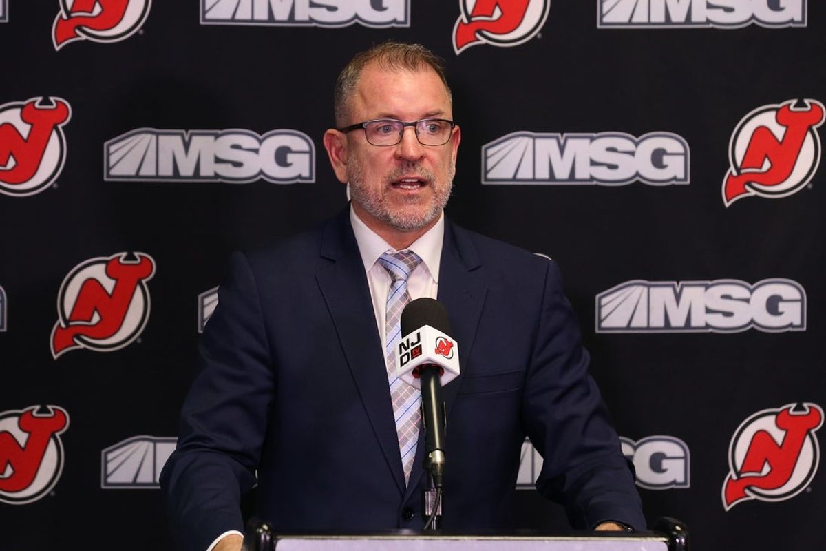 Nov 30, 2021; Newark, New Jersey, USA; New Jersey Devils executive vice president/general managerTom Fitzgerald, addresses the media about the contract extension of New Jersey Devils center Jack Hughes (86) before the start of the game against the San Jose Sharks at Prudential Center. Mandatory Credit: Tom Horak-Imagn Images