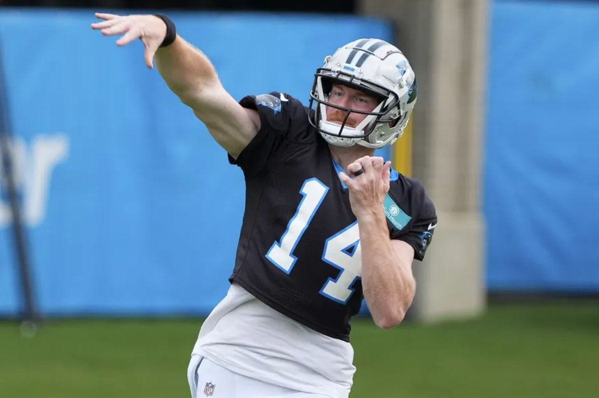 Jul 30, 2024; Charlotte, NC, USA; Carolina Panthers quarterback Andy Dalton (14) throws during training camp at Carolina Panthers Practice Fields. Mandatory Credit: Jim Dedmon-USA TODAY Sports