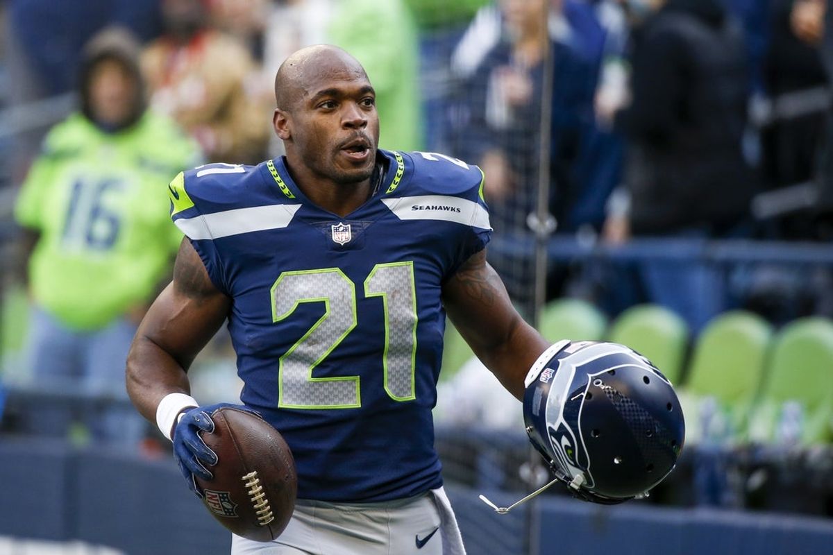Dec 5, 2021; Seattle, Washington, USA; Seattle Seahawks running back Adrian Peterson (21) returns to the locker room following pregame warmups against the San Francisco 49ers at Lumen Field. Mandatory Credit: Joe Nicholson-Imagn Images