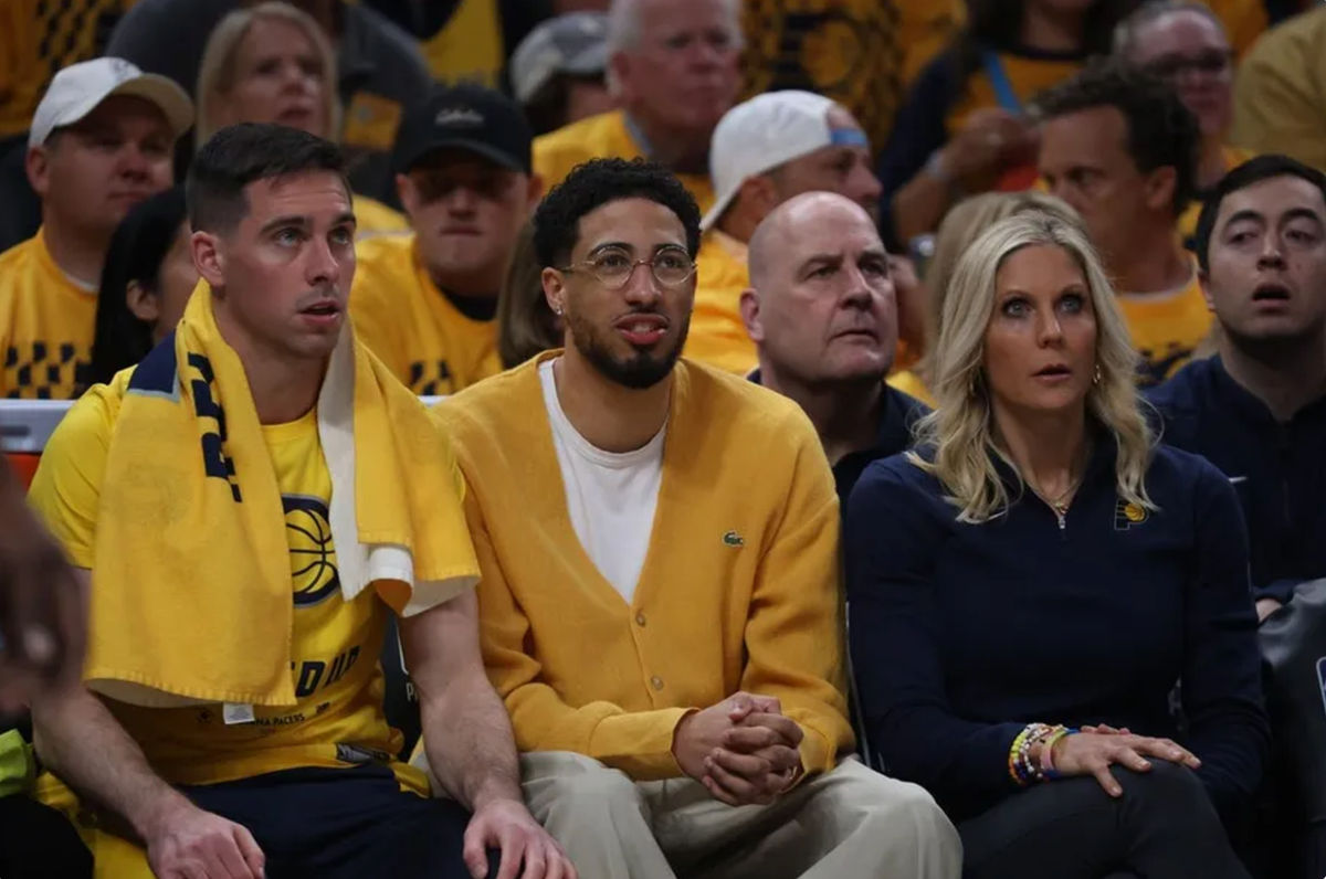 May 25, 2024; Indianapolis, Indiana, USA; Indiana Pacers guard Tyrese Haliburton (middle) looks on from the bench during the first quarter of game three of the eastern conference finals against the Boston Celtics in the 2024 NBA playoffs at Gainbridge Fieldhouse. Mandatory Credit: Trevor Ruszkowski-USA TODAY Sports