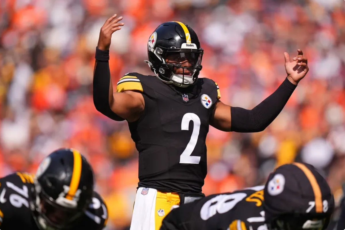 Sep 15, 2024; Denver, Colorado, USA; Pittsburgh Steelers quarterback Justin Fields (2) during the first quarter against the Denver Broncos at Empower Field at Mile High. Mandatory Credit: Ron Chenoy-Imagn Images