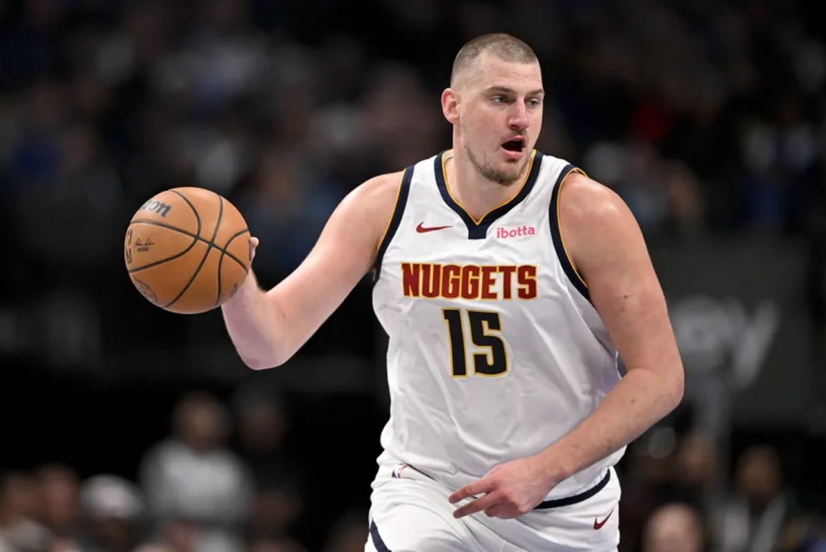 Jan 12, 2025; Dallas, Texas, USA; Denver Nuggets center Nikola Jokic (15) brings the ball up court against the Dallas Mavericks during the second half at the American Airlines Center. Mandatory Credit: Jerome Miron-Imagn Images