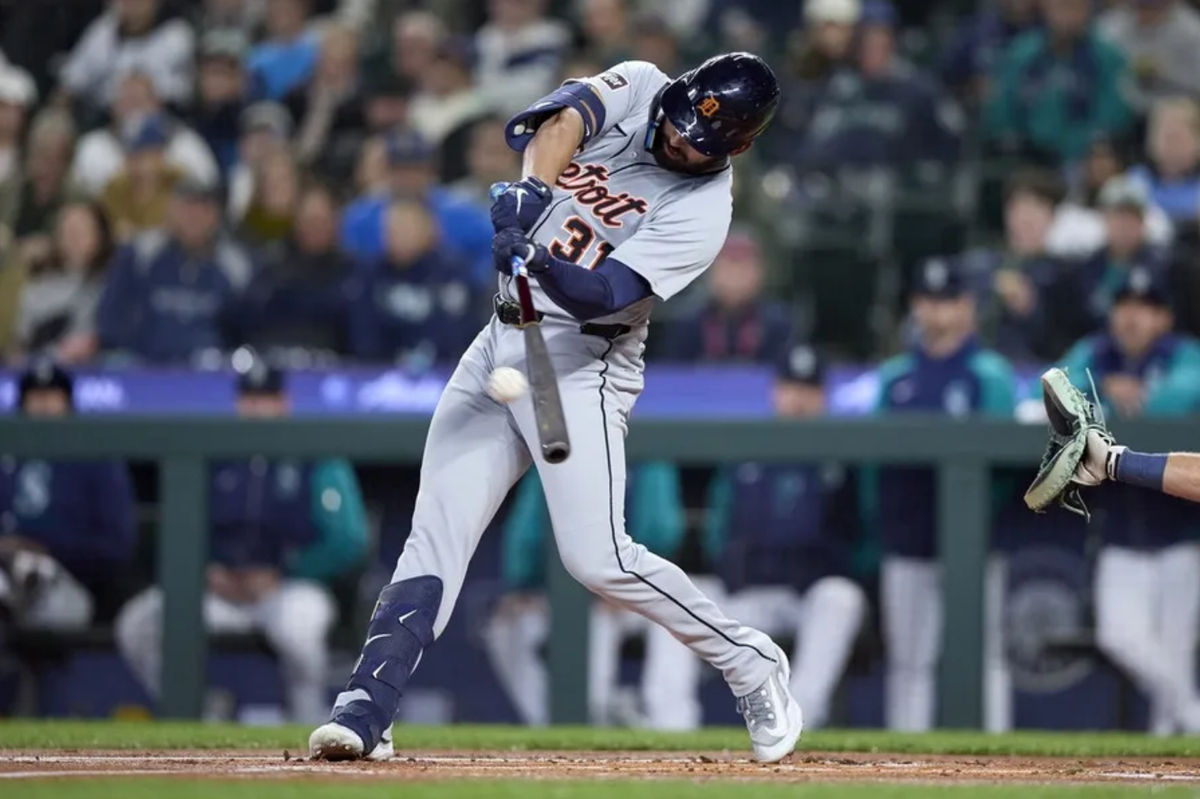 Mar 31, 2025; Seattle, Washington, USA; Detroit Tigers center fielder Riley Greene (31) hits a home run during the first inning at T-Mobile Park. Mandatory Credit: John Froschauer-Imagn Images