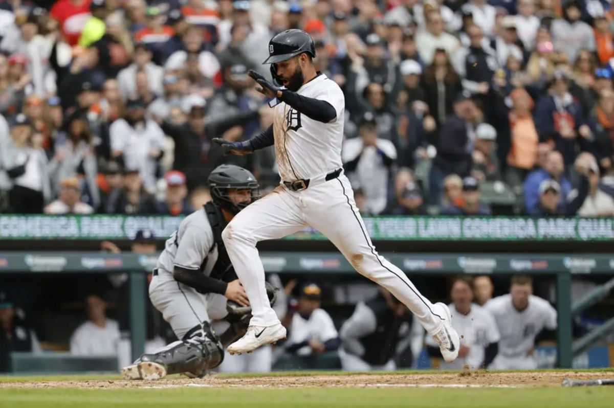 Apr 4, 2025; Detroit, Michigan, USA; Detroit Tigers outfielder Riley Greene (31) scores in the fourth inning against the Chicago White Sox at Comerica Park. Mandatory Credit: Rick Osentoski-Imagn Images