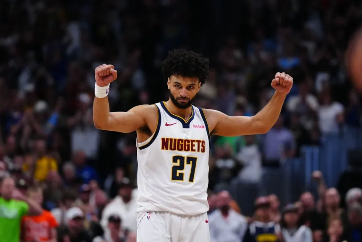 Apr 11, 2025; Denver, Colorado, USA; Denver Nuggets guard Jamal Murray (27) celebrates defeating the Memphis Grizzlies at Ball Arena. Mandatory Credit: Ron Chenoy-Imagn Images