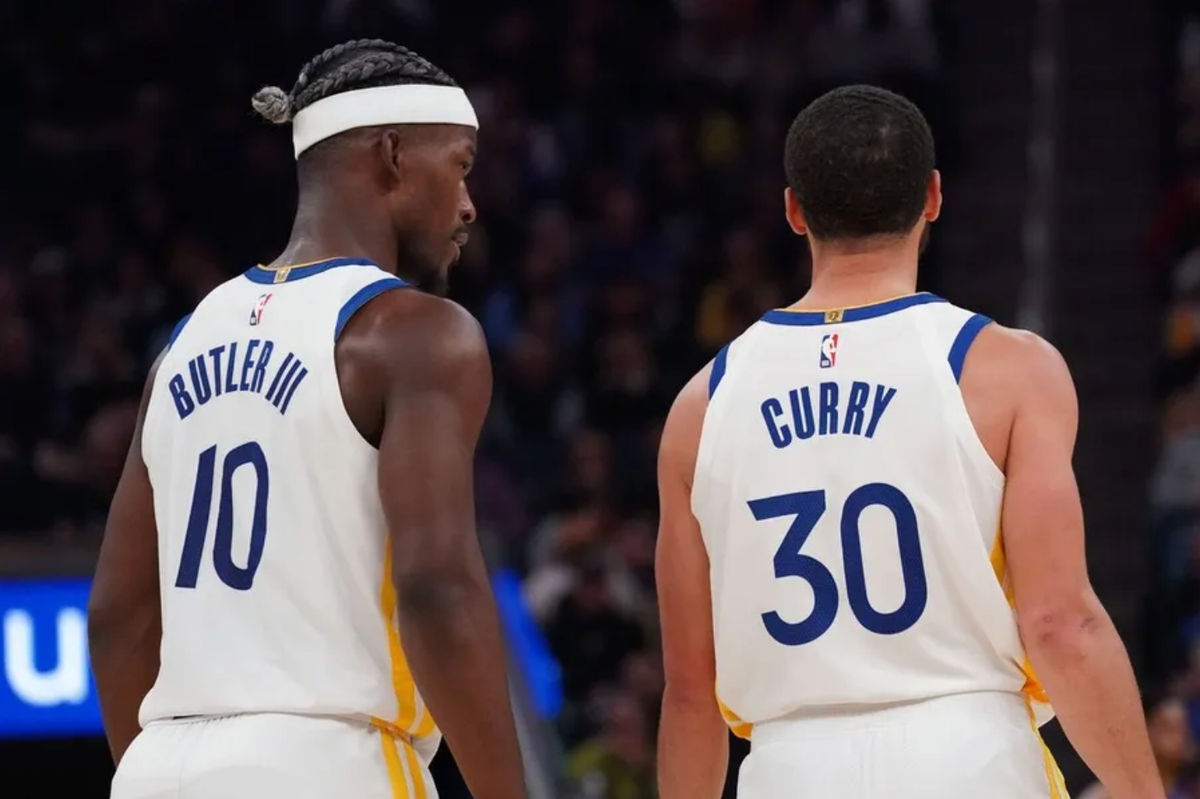 Mar 8, 2025; San Francisco, California, USA; Golden State Warriors forward Jimmy Butler III (10) talks with guard Stephen Curry (30) during a game against the Detroit Pistons in the second quarter at Chase Center. Mandatory Credit: David Gonzales-Imagn Images