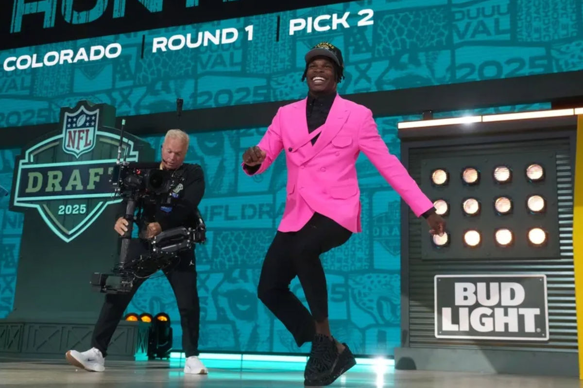 Apr 24, 2025; Green Bay, WI, USA; Colorado Buffaloes wide receiver Travis Hunter is selected by the Jacksonville Jaguars as the number two pick in the first round of the 2025 NFL Draft at Lambeau Field. Mandatory Credit: Kirby Lee-Imagn Images