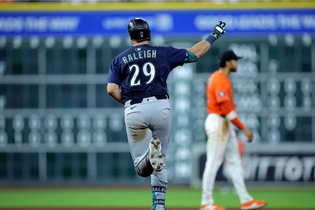May 23, 2025; Houston, Texas, USA; Seattle Mariners catcher Cal Raleigh (29) reacts after hitting a two-run home run against the Houston Astros during the seventh inning at Daikin Park. Mandatory Credit: Erik Williams-Imagn Images