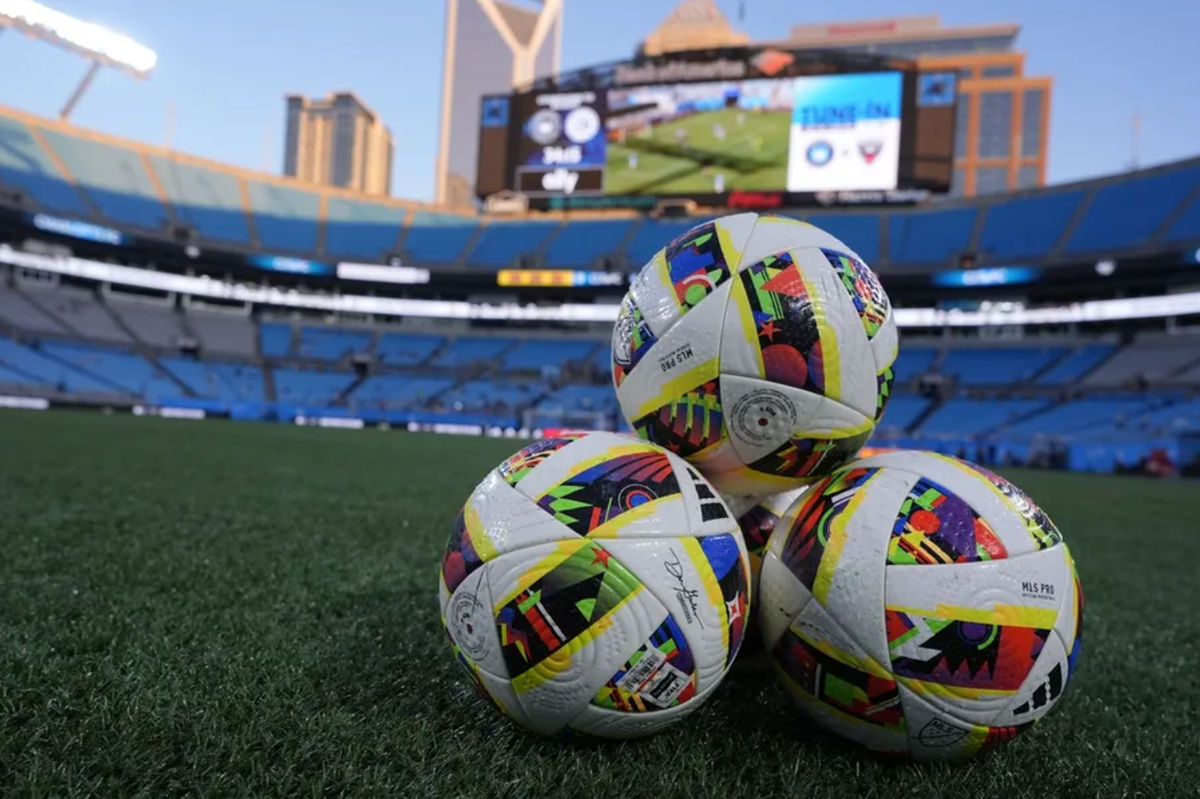 Oct 2, 2024; Charlotte, North Carolina, USA; A general view of Adidas MLS soccer balls on the pitch before the game between the Charlotte FC and Chicago Fire FC at Bank of America Stadium. Mandatory Credit: Jim Dedmon-Imagn Images