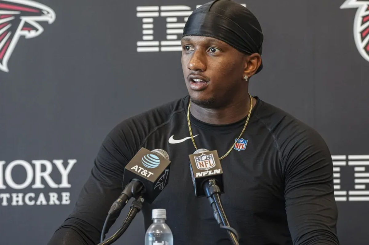 Jul 24, 2025; Flowery Branch, GA, USA; Atlanta Falcons quarterback Michael Penix Jr. (9) talks to the media after practice during training camp at IBM Performance Field. Mandatory Credit: Dale Zanine-Imagn Images