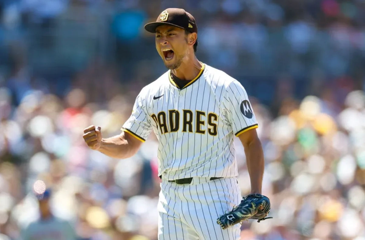 Jul 30, 2025; San Diego, California, USA; San Diego Padres starting pitcher Yu Darvish (11) celebrates after striking out a batter during the sixth inning against the New York Mets at Petco Park. Mandatory Credit: David Frerker-Imagn Images