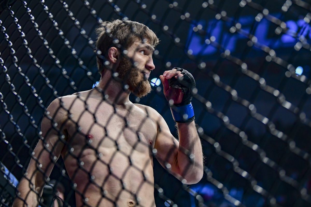 Jan 22, 2022; Anaheim, California, USA; Said Nurmagomedov (blue gloves) celebrates his win by submission against Cody Stamann (red gloves) during UFC 270 at Honda Center. Mandatory Credit: Gary A. Vasquez-Imagn Images