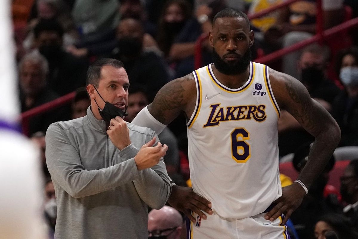 Jan 23, 2022; Miami, Florida, USA; Los Angeles Lakers forward LeBron James (6) stands with head coach Frank Vogel (L) during the first half against the Miami Heat at FTX Arena. Mandatory Credit: Jasen Vinlove-Imagn Images