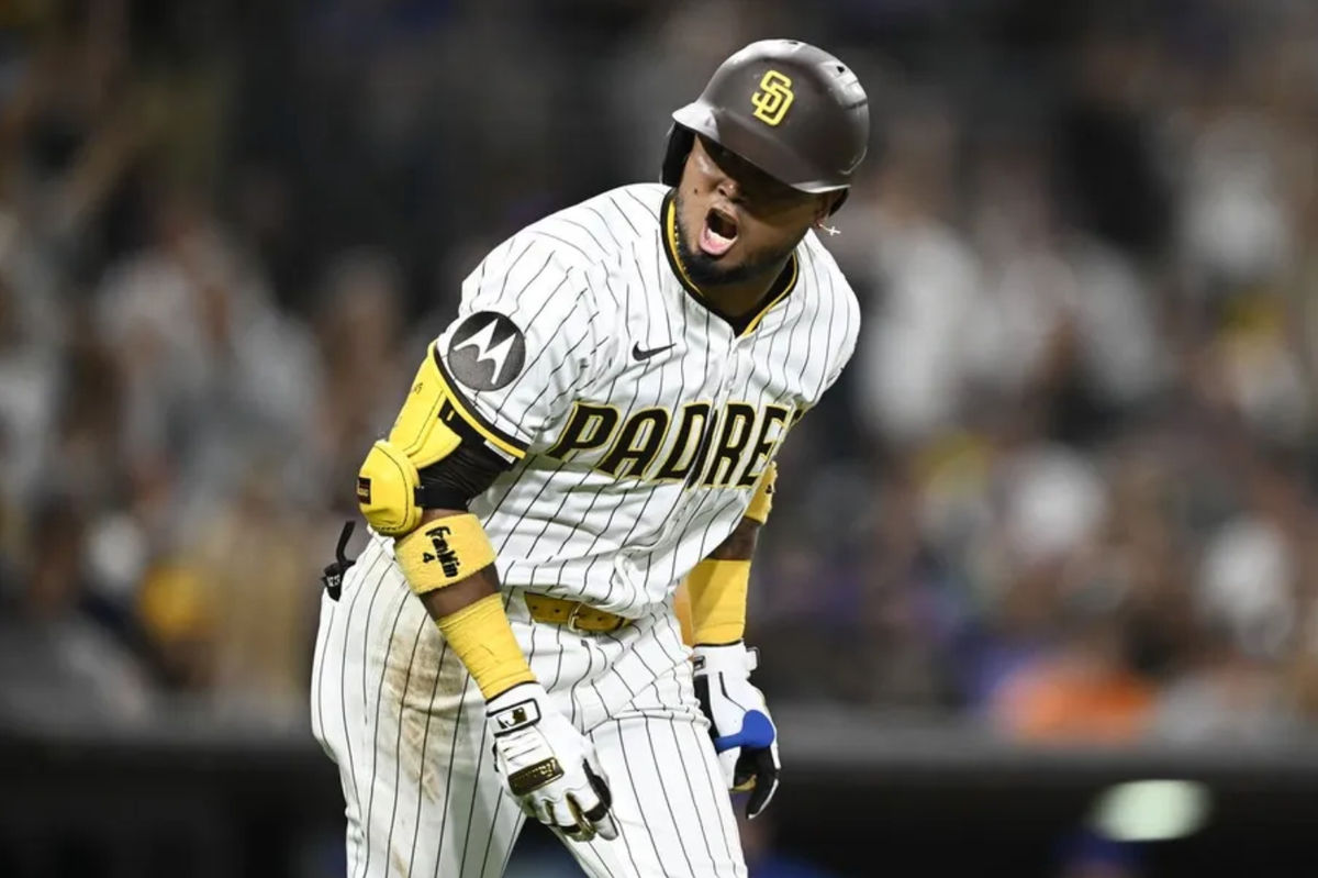 Jul 28, 2025; San Diego, California, USA; San Diego Padres first baseman Luis Arraez (4) celebrates after hititng a two-run home run during the fifth inning against the New York Mets at Petco Park. Mandatory Credit: Denis Poroy-Imagn Images
