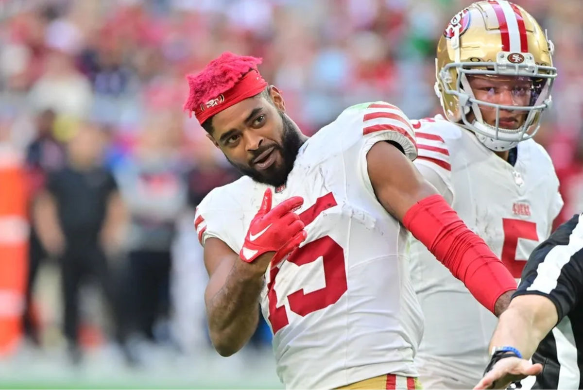 Jan 5, 2025; Glendale, Arizona, USA; San Francisco 49ers wide receiver Jauan Jennings (15) reacts in the first half prior to being ejected from the game against the Arizona Cardinals at State Farm Stadium. Mandatory Credit: Matt Kartozian-Imagn Images