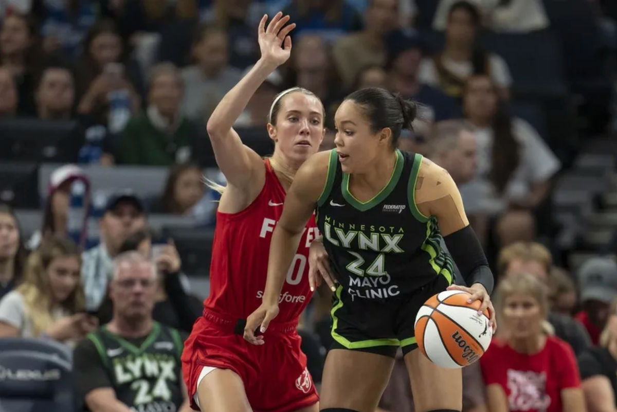 Aug 24, 2025; Minneapolis, Minnesota, USA; Minnesota Lynx forward Napheesa Collier (24) drives to the basket past Indiana Fever guard Lexie Hull (10) in the second half at Target Center. Mandatory Credit: Jesse Johnson-Imagn Images