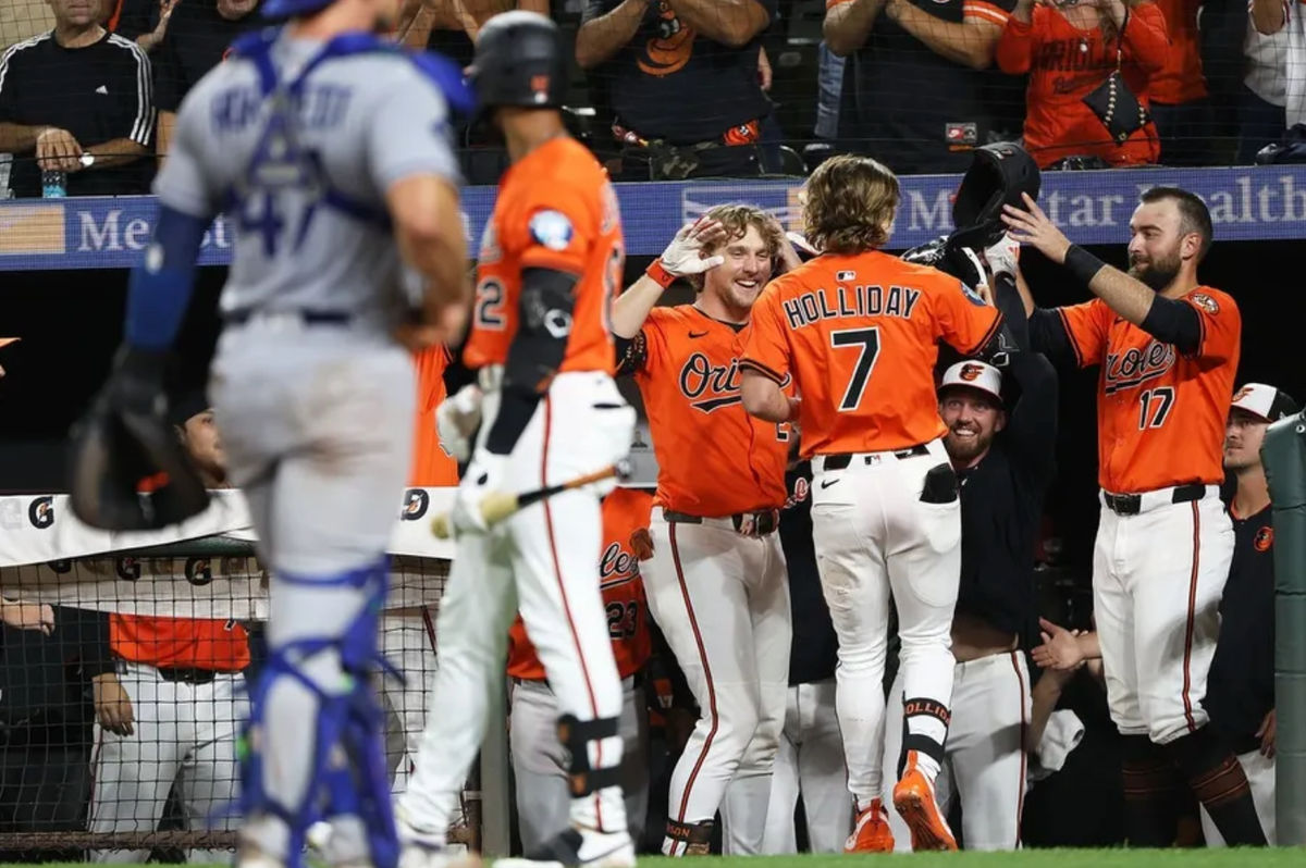 Sep 6, 2025; Baltimore, Maryland, USA; Baltimore Orioles second baseman Jackson Holliday (7) celebrates after hitting a home run during the ninth inning against the Los Angeles Dodgers at Oriole Park at Camden Yards. Mandatory Credit: Daniel Kucin Jr.-Imagn Images