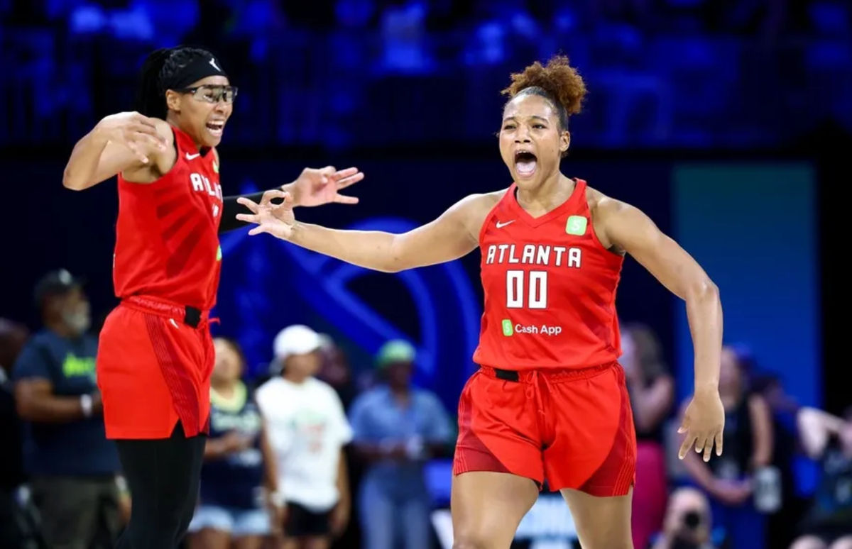 Jul 30, 2025; Arlington, Texas, USA; Atlanta Dream forward Naz Hillmon (00) celebrates with Atlanta Dream guard Allisha Gray (15) after hitting the game-winning shot against the Dallas Wings during the second half at College Park Center. Mandatory Credit: Kevin Jairaj-Imagn Images