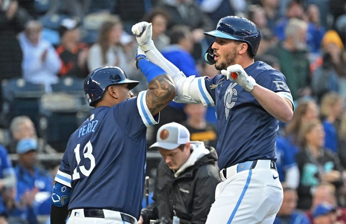 Apr 19, 2024; Kansas City, Missouri, USA; Kansas City Royals first baseman Vinnie Pasquantino (9) celebrates with teammate catcher Salvador Perez (13) after hitting a solo home run in the fourth inning against the Baltimore Orioles at Kauffman Stadium.