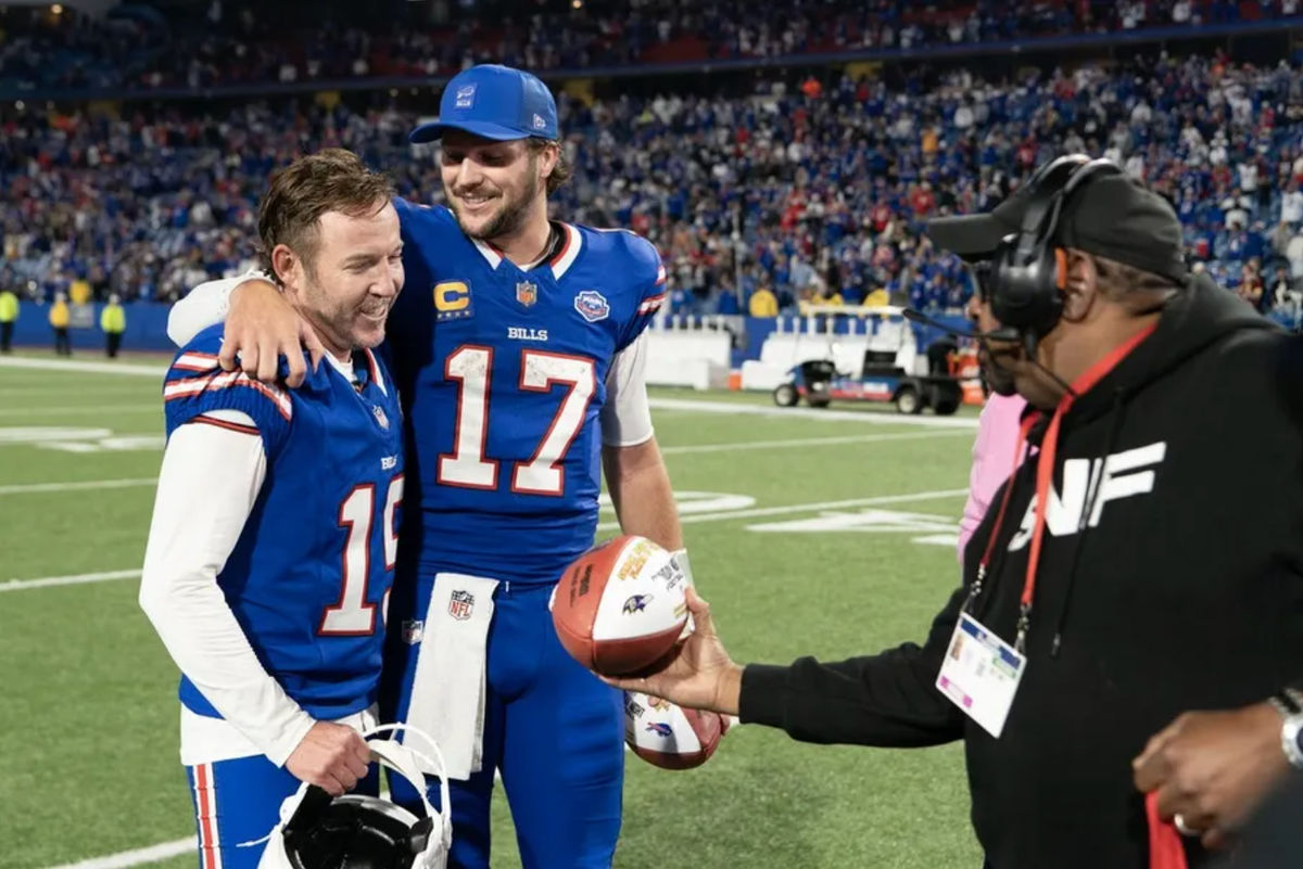 Sep 7, 2025; Orchard Park, New York, USA; Buffalo Bills place kicker Matt Prater (19) is presented with the Sunday Night Football game ball along with Buffalo Bills quarterback Josh Allen (17) after the game between the Baltimore Ravens and Buffalo Bills at Highmark Stadium. Mandatory Credit: Gregory Fisher-Imagn Images