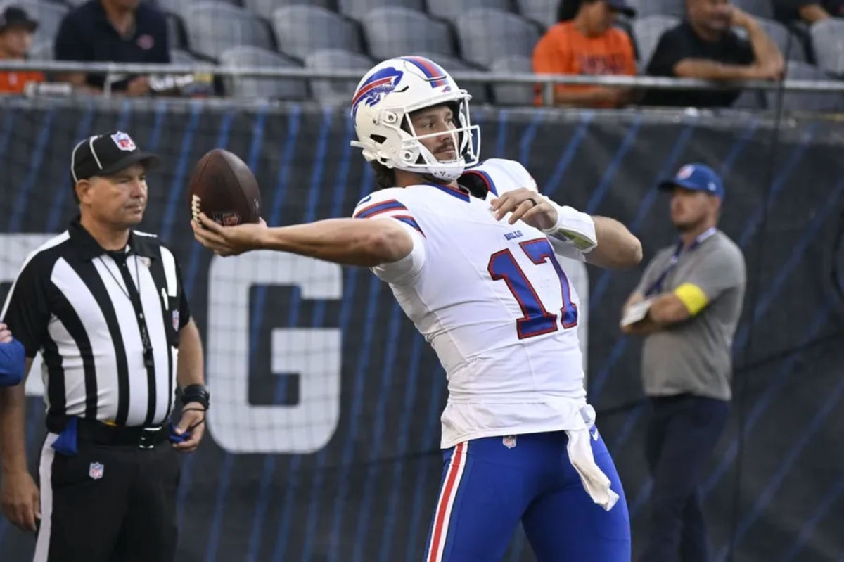 Aug 17, 2025; Chicago, Illinois, USA; Buffalo Bills quarterback Josh Allen (17) during warmups before a preseason game against the Chicago Bears at Soldier Field. Mandatory Credit: Matt Marton-Imagn Images