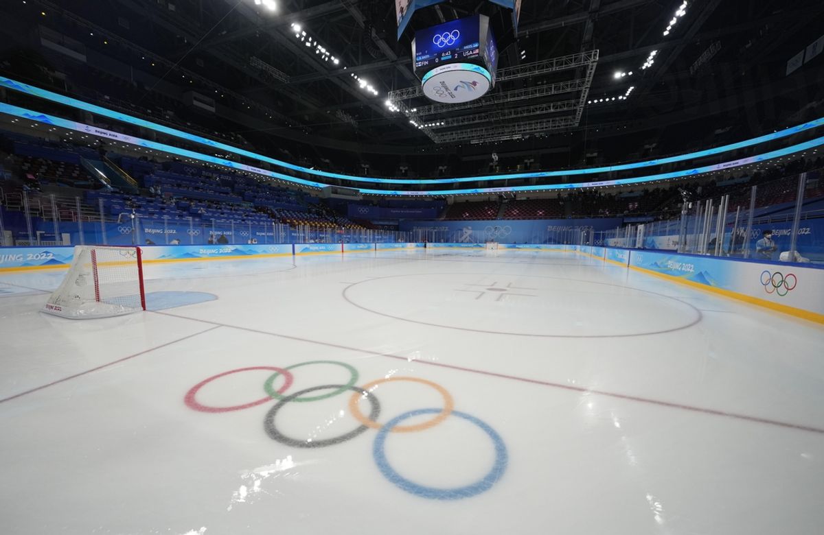 Feb 3, 2022; Beijing, China; A general view of the Olympic rings on the ice surface between periods in a women's ice hockey Group A match between USA and Finland during the Beijing 2022 Olympic Winter Games at Wukesong Sports Centre. Mandatory Credit: Michael Madrid-Imagn Images