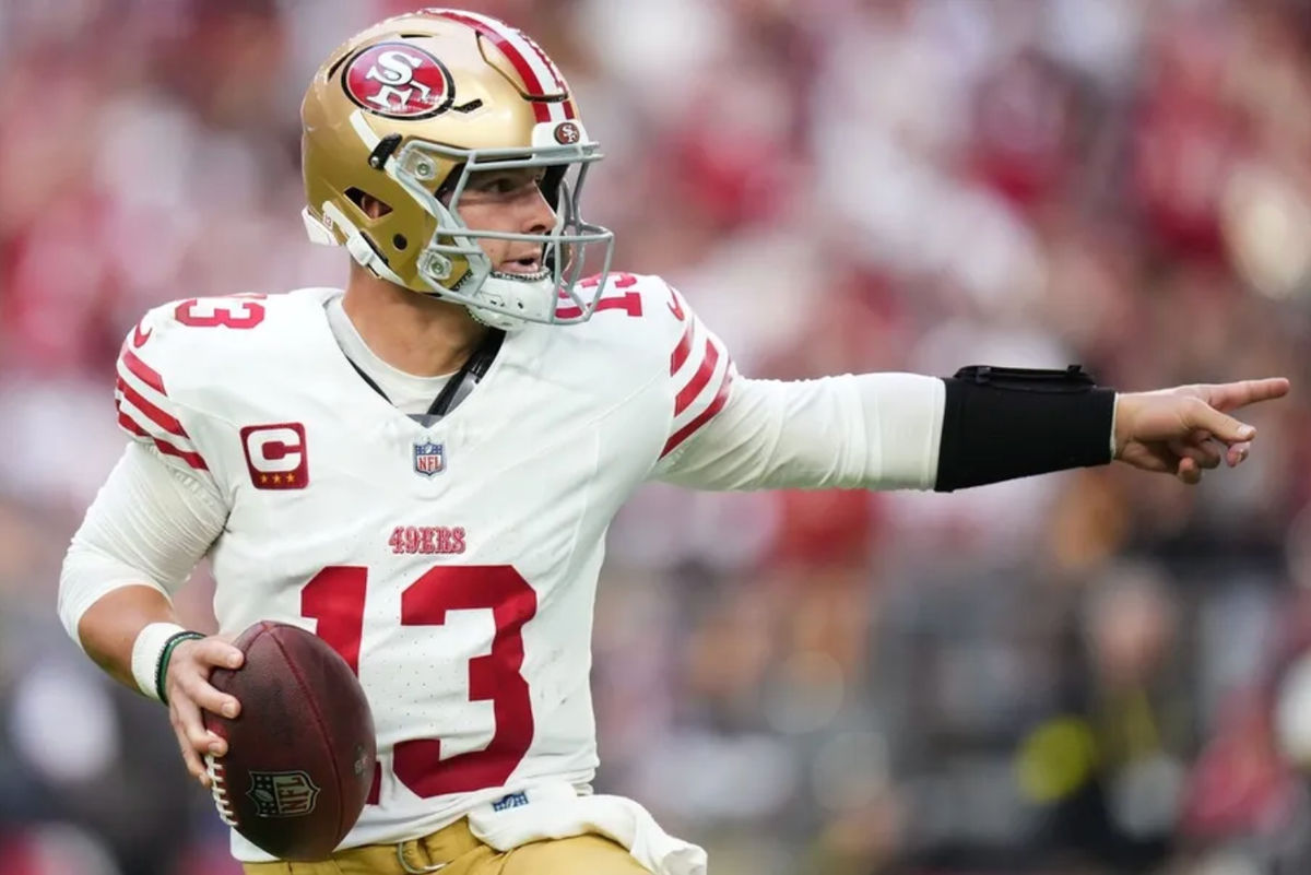 San Francisco 49ers quarterback Brock Purdy (13) scrambles out of the pocket against the Arizona Cardinals at State Farm Stadium in Glendale on Nov. 16, 2025. PHOTO USA TODAY SPORTS IMAGES