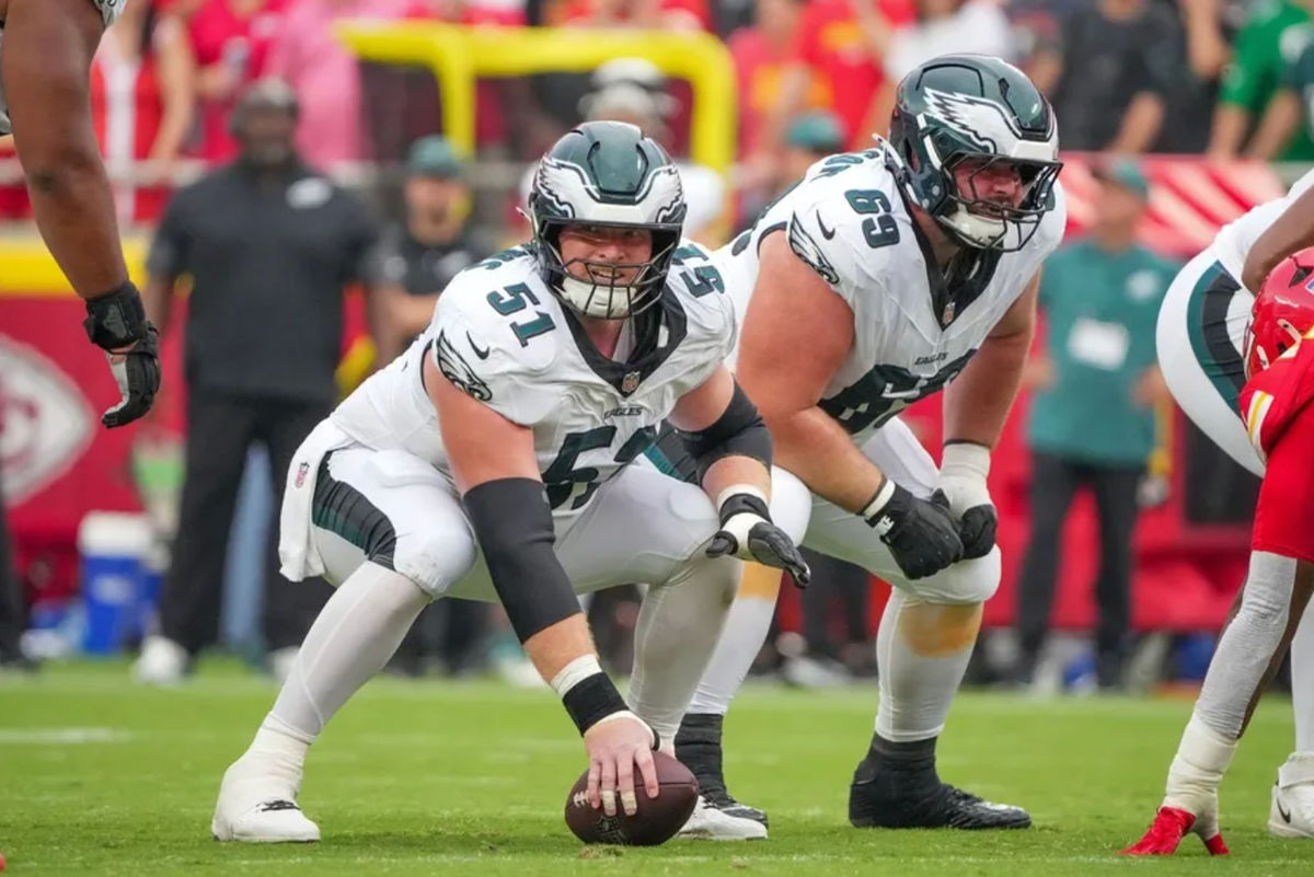 Sep 14, 2025; Kansas City, Missouri, USA; Philadelphia Eagles center Cam Jurgens (51) and guard Landon Dickerson (69) at the line of scrimmage against the Kansas City Chiefs during the second half of the game at GEHA Field at Arrowhead Stadium. Mandatory Credit: Denny Medley-Imagn Images