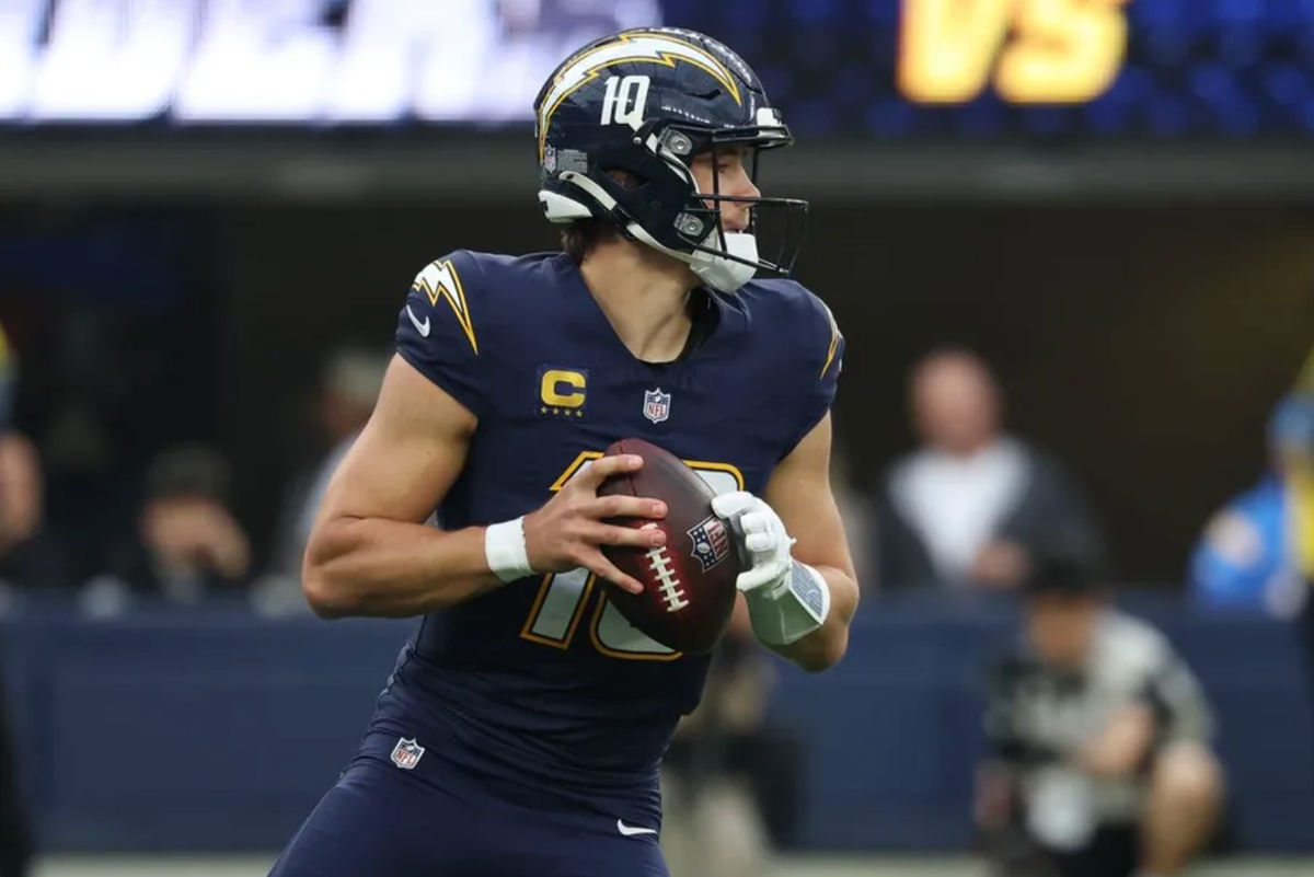 Nov 30, 2025; Inglewood, California, USA; Los Angeles Chargers quarterback Justin Herbert (10) drops back to pass against the Las Vegas Raiders during the second half at SoFi Stadium. Mandatory Credit: Kiyoshi Mio-Imagn Images