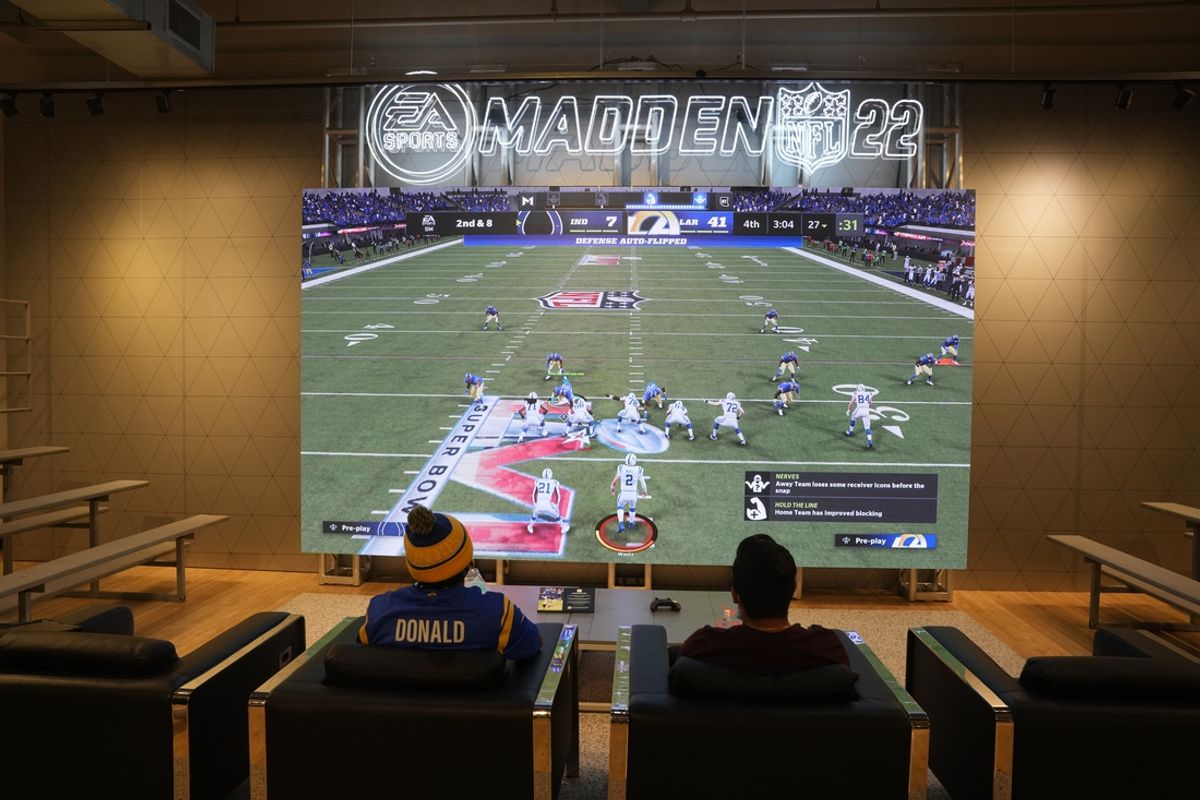 Feb 9, 2022; Los Angeles, CA, USA; People play EA Sports Madden 22 video game at the Nike store at the Grove. Mandatory Credit: Kirby Lee-Imagn Images