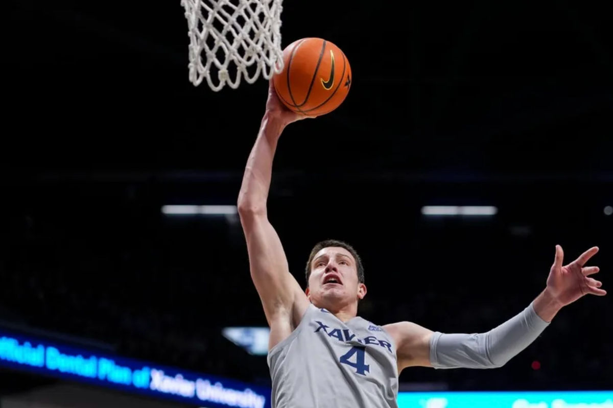Dec 12, 2025; Cincinnati, Ohio, USA; Xavier Musketeers forward Filip Borovicanin (4) dunks the ball against the Missouri State Bears in the first half at the Cintas Center. Mandatory Credit: Aaron Doster-Imagn Images