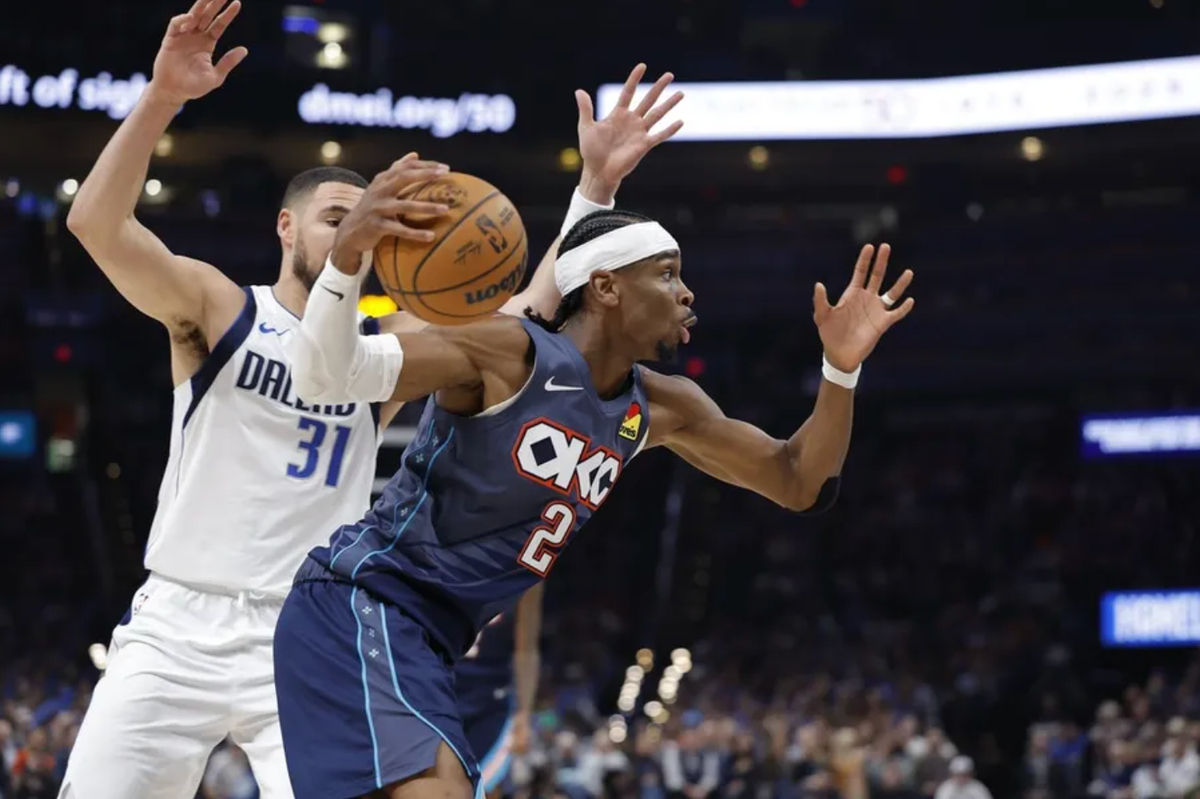 Dec 5, 2025; Oklahoma City, Oklahoma, USA; Oklahoma City Thunder guard Shai Gilgeous-Alexander (2) moves the ball past Dallas Mavericks guard Klay Thompson (31) during the second half at Paycom Center. Mandatory Credit: Alonzo Adams-Imagn Images