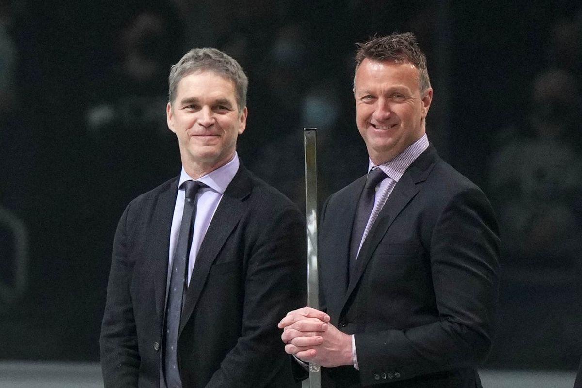 Feb 15, 2022; Los Angeles, California, USA; LA Kings president Luc Robitaille (left) and general manager Rob Blake react during the game against the Edmonton Oilers at Crypto.com Arena. Mandatory Credit: Kirby Lee-Imagn Images