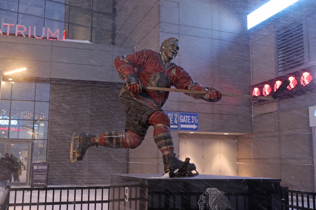 Feb 17, 2022; Chicago, Illinois, USA; A statue of former Chicago Blackhawks forward Bobby Hull is seen during a snowstorm outside the United Center prior to a game between the Blackhawks and the Columbus Blue Jackets. Mandatory Credit: Dennis Wierzbicki-Imagn Images