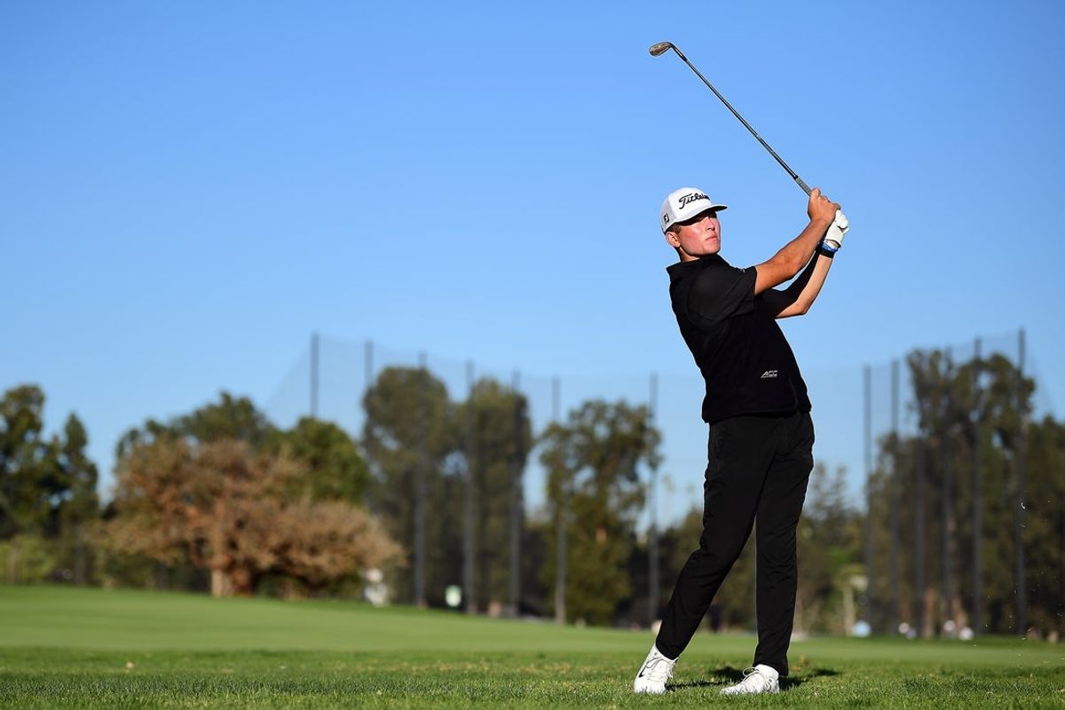 Feb 17, 2022; Pacific Palisades, California, USA; Michael Brennan plays his shot on the third fairway during the first round of the Genesis Invitational golf tournament. Mandatory Credit: Gary A. Vasquez-Imagn Images