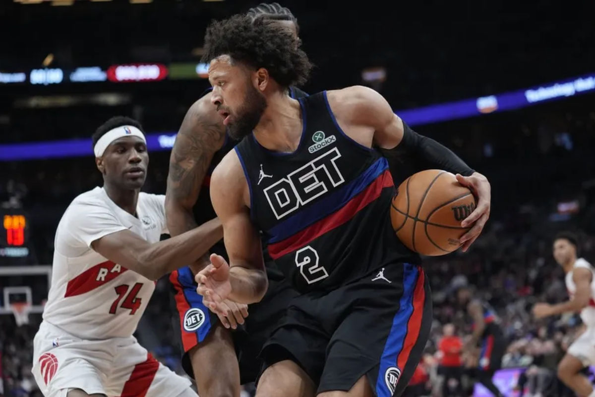 Feb 11, 2026; Toronto, Ontario, CAN; Detroit Pistons guard Cade Cunningham (2) controls the ball against Toronto Raptors guard Ja'Kobe Walter (14) during the second half at Scotiabank Arena. Mandatory Credit: John E. Sokolowski-Imagn Images