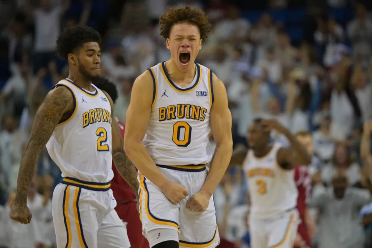 31 de enero de 2026; Los Ángeles, California, EE. UU.; El base de los UCLA Bruins, Trent Perry (0), reacciona tras una canasta de tres puntos que igualó el partido a un segundo del tiempo reglamentario contra los Indiana Hoosiers en el Pauley Pavilion, presentado por Wescom Financial. Crédito obligatorio: Jayne Kamin-Oncea-Imagn Images.
