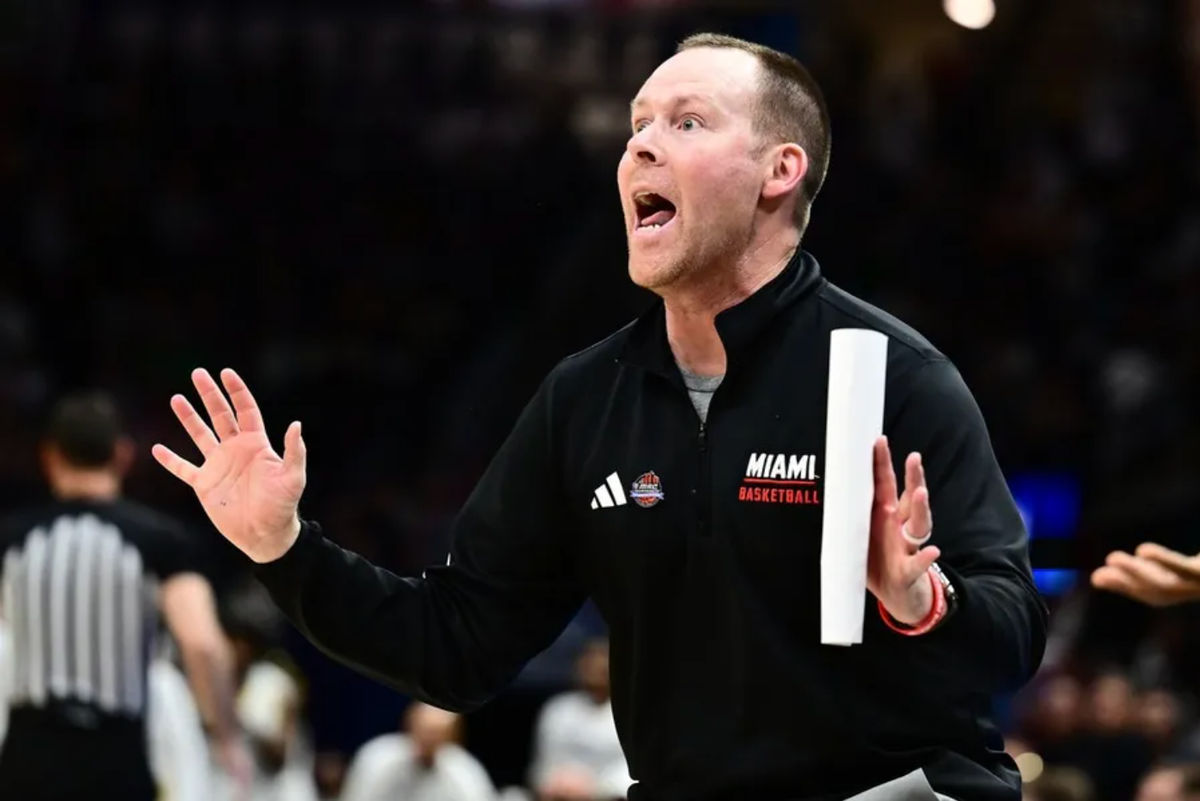 Mar 15, 2025; Cleveland, OH, USA; Miami (Oh) Redhawks head coach Travis Steele reacts against the Akron Zips during the second half of the MAC Conference Tournament Championship game at Rocket Arena. Mandatory Credit: Ken Blaze-Imagn Images