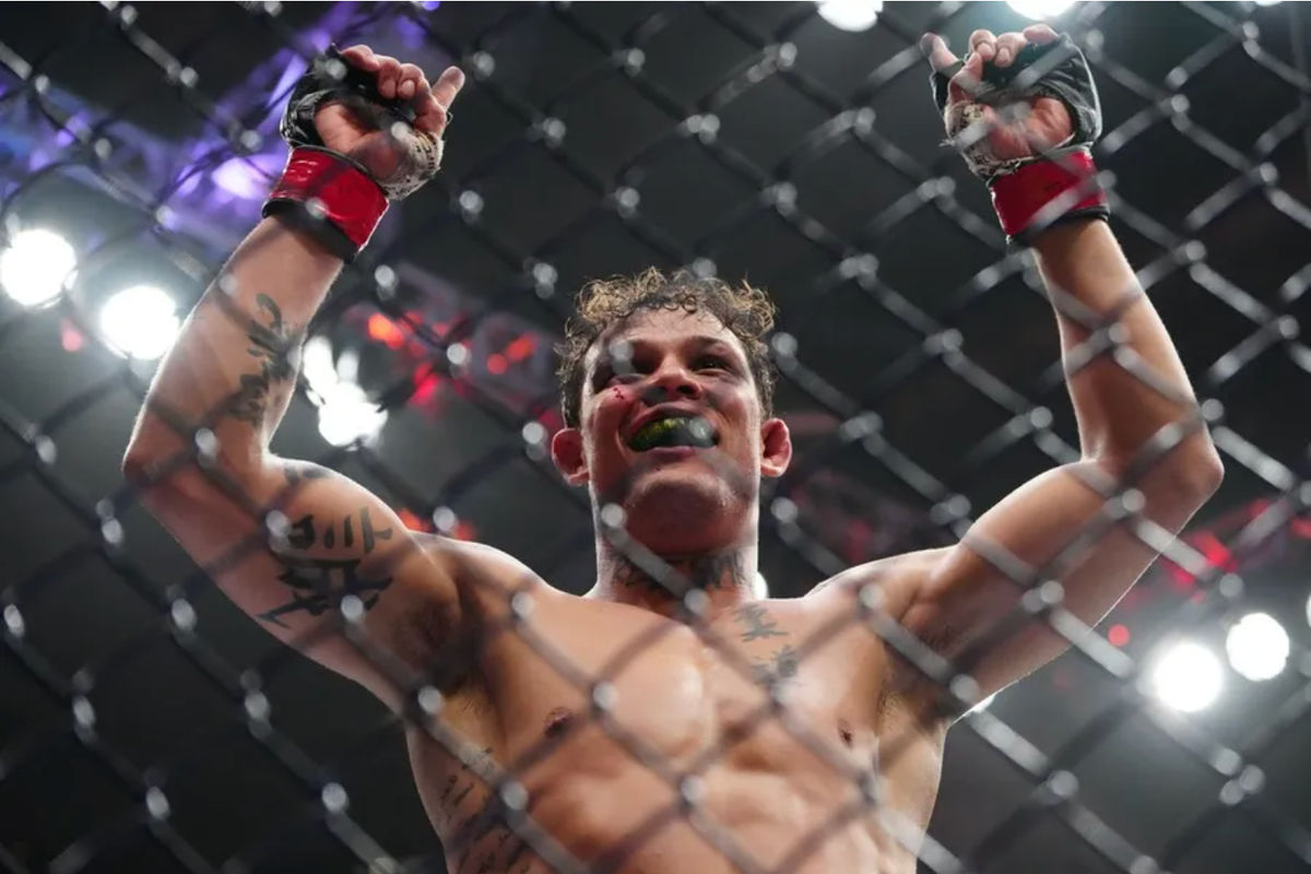 Mar 7, 2026; Las Vegas, Nevada, UNITED STATES; Caio Borralho (red gloves) reacts after defeating Reinier De Ridder (blue gloves) during UFC 326 at T-Mobile Arena. Mandatory Credit: Stephen R. Sylvanie-Imagn Images