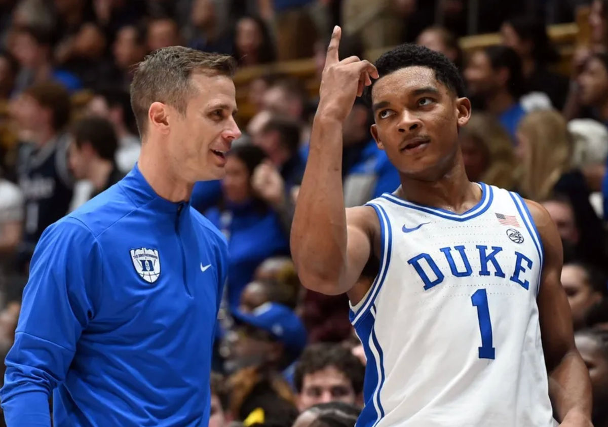 Duke Blue Devils guard Caleb Foster (1) gestures to head coach Jon Scheyer during the second half against the Virginia Cavaliers at Cameron Indoor Stadium. Duke won 77-51. Mandatory Credit: Rob Kinnan-Imagn Images