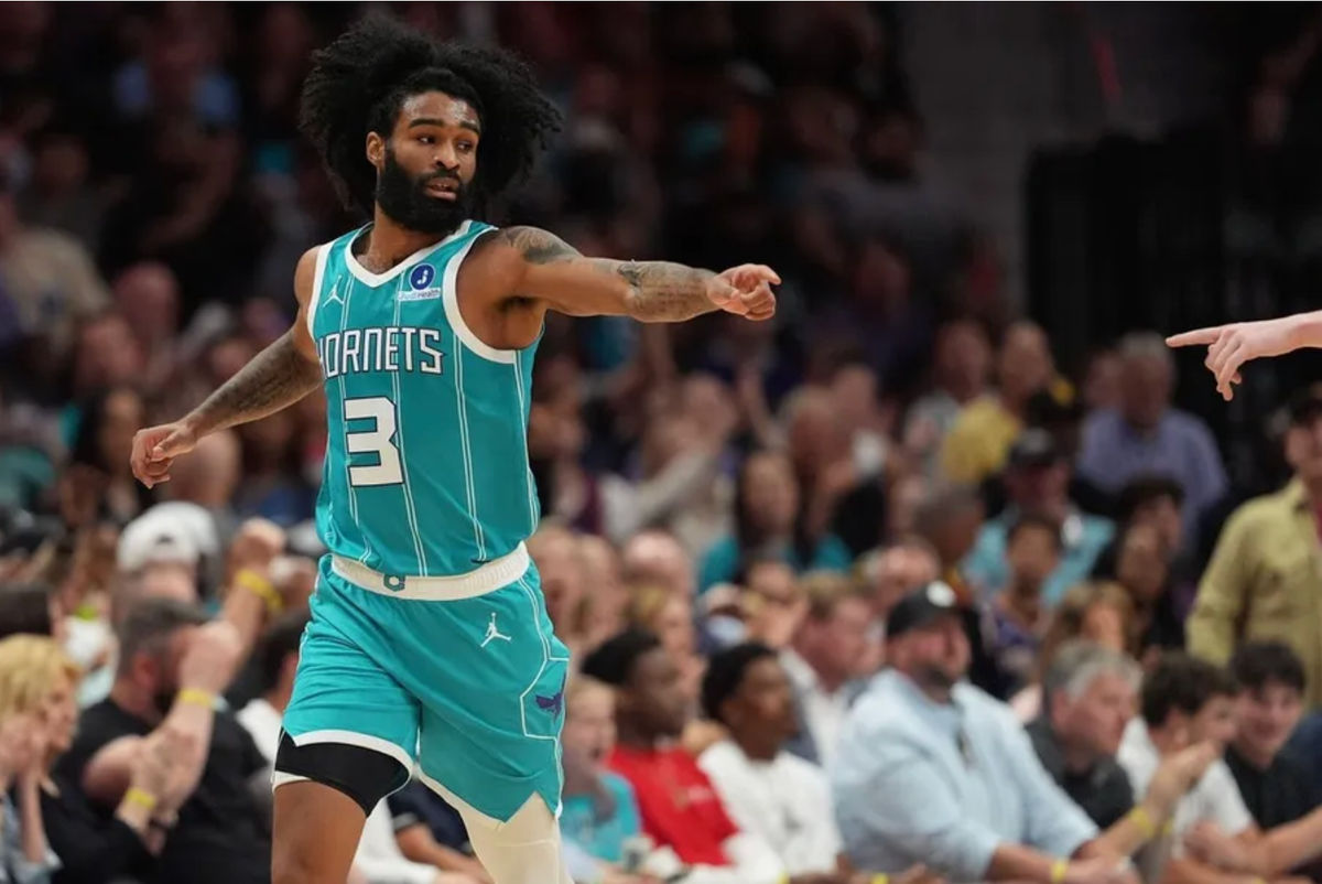 Apr 2, 2026; Charlotte, North Carolina, USA; Charlotte Hornets guard Coby White (3) acknowledges an assist from guard/forward Kon Knueppel (7) during the second quarter against the Phoenix Suns at Spectrum Center. Mandatory Credit: Jim Dedmon-Imagn Images