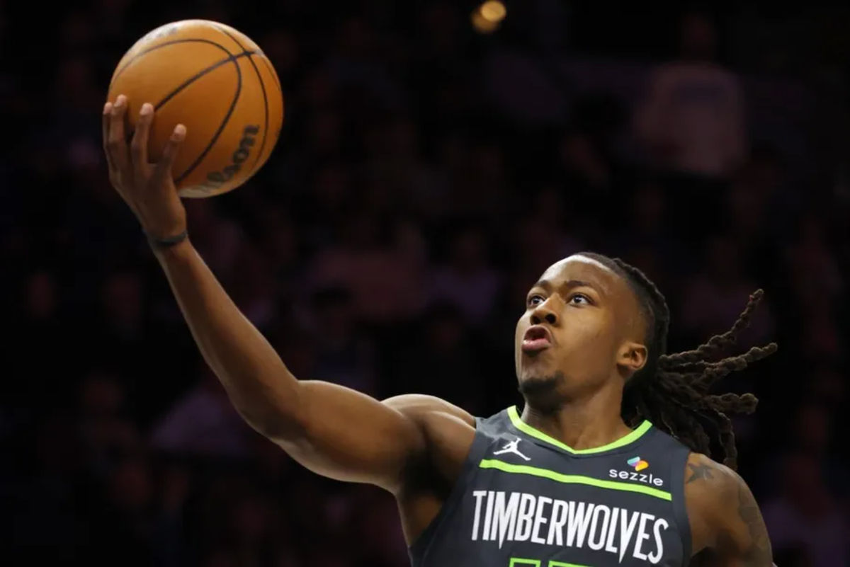 Mar 17, 2026; Minneapolis, Minnesota, USA; Minnesota Timberwolves guard Ayo Dosunmu (13) goes to the basket against the Phoenix Suns in the third quarter at Target Center. Mandatory Credit: Bruce Kluckhohn-Imagn Images