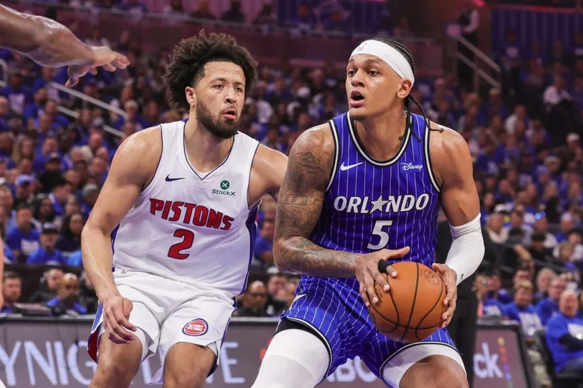 Apr 27, 2026; Orlando, Florida, USA; Orlando Magic forward Paolo Banchero (5) looks to pass in front of Detroit Pistons guard Cade Cunningham (2) during the second half during game four of the first round of the 2026 NBA Playoffs at Kia Center. Mandatory Credit: Mike Watters-Imagn Images